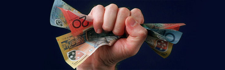 Boom! The Budget Bang – How does it affect your hip pocket? fist holding $80 in Australian currency